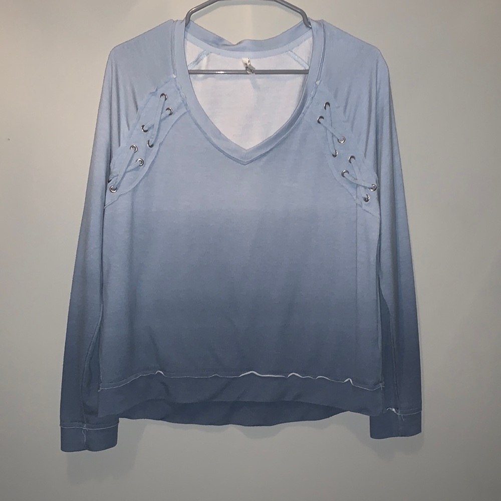 This fading blue long sleeve fits perfectly and is adorable for any occasion!